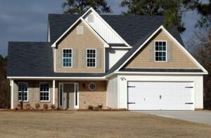 Why Coastal Garage Door Springs Require a Different Maintenance Strategy